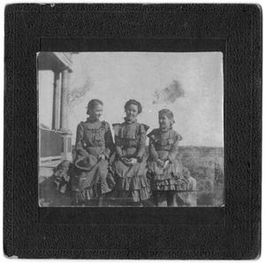 [Three Seated Young Women]