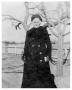 Thumbnail image of item number 1 in: '[Elderly Woman in a Long Black Peacoat]'.