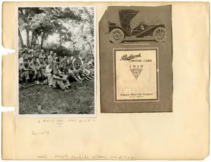 [Seated Boy Scouts and an Automobile Advertisement]