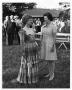 Photograph: [Lady Bird Johnson with a Costumed Woman]