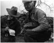 Thumbnail image of item number 1 in: '[A. S. Jackson and Leonard Royal Banding a Turkey]'.