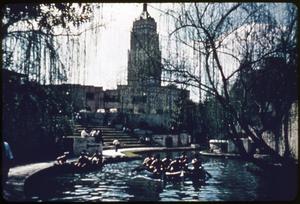 San Antonio River- Arneson Theatre with people in canoes on river
