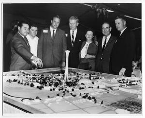 People looking at a concept model of HemisFair '68