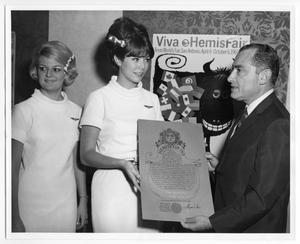 William Sinkin holding a HemisFair 1968 International Ambassador certificate