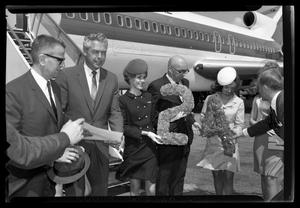 HemisFair '68 officials next to an airplane