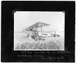 Photograph: [Aerial Flyer A. W. Comings in Front of Biplane]
