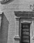 Photograph: [Catholic Church School, (Detail: South doorway)]