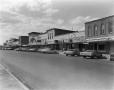Photograph: [Town Square Commercial Building, (Northeast oblique of Highway 87)]
