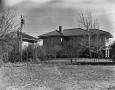 Photograph: [Swenson House, (Rear facade and carriage house)]