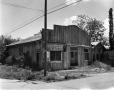 Photograph: [Moscatelli Grocery and Buckhorn Barber]