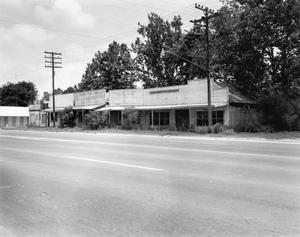 [Row Commercial Buildings, (Tin front and West facade)]