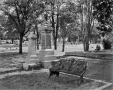 Photograph: [Cemetery - Bench with 2 Monuments]