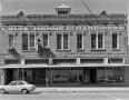 Photograph: [Henne Hardware Building, (East elevation and store front)]