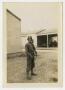 Thumbnail image of item number 1 in: '[Young Man With Rifle Near Building]'.