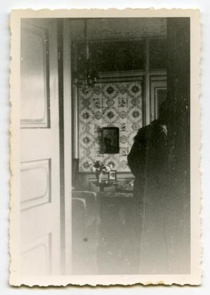 [Photograph of Man in Room]