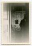 Photograph: [Photograph of Man in Room]