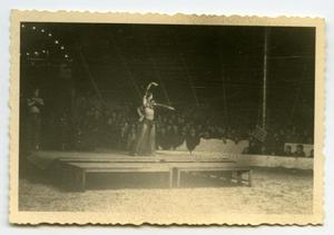 [Photograph of Woman Performing]