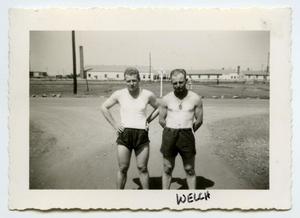[Photograph of Two Soldiers outside Camp]