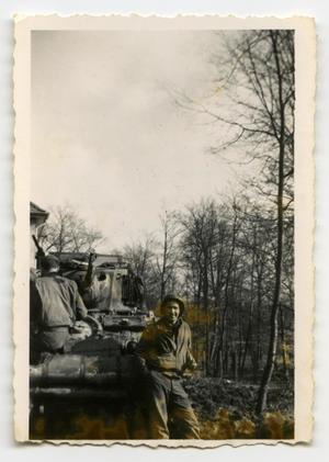 [Two Soldiers Sitting on a Tank]