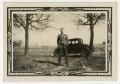 Primary view of [Man in Decorated Uniform Near Car]