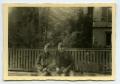 Thumbnail image of item number 1 in: '[Photograph of Soldiers Sitting by Fence]'.