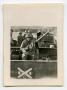 Thumbnail image of item number 1 in: '[Photograph of Soldier with Machine Gun]'.