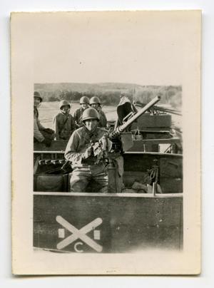 [Photograph of Soldier with Machine Gun]