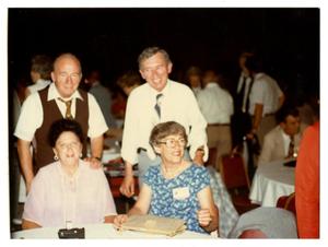 Primary view of object titled '[Photograph of Two Couples at Event]'.