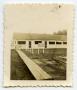Thumbnail image of item number 1 in: '[Photograph of 12th Armored Division Maintenance Battalion Headquarters Building]'.
