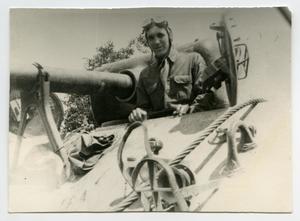[A Soldier Riding in a Tank]