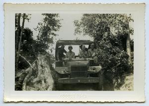 [Photograph of Soldiers Driving a Carrier]