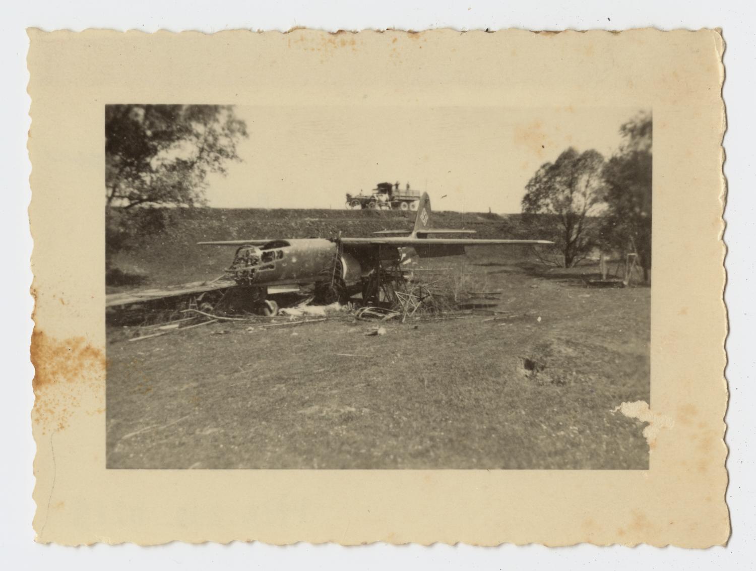 [Photograph of Airplane Wreckage]
                                                
                                                    [Sequence #]: 1 of 2
                                                