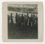 Thumbnail image of item number 1 in: '[A Group of Soldiers Standing on the Rail of a Ship]'.
