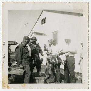 [Group of Men With Caught Fish]