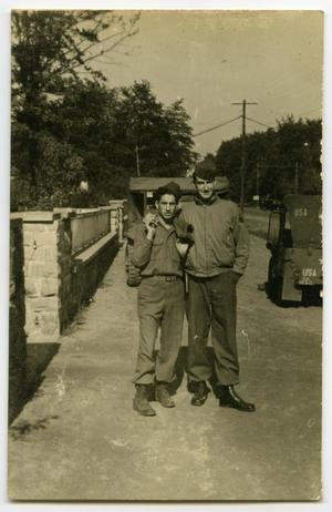 [Two Soldiers Standing Together with Jackets]