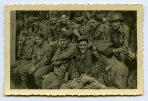 [A Large Group of Soldiers Sitting for a Picture]