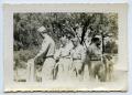 Photograph: [Soldiers Walk Over a Small Bridge]