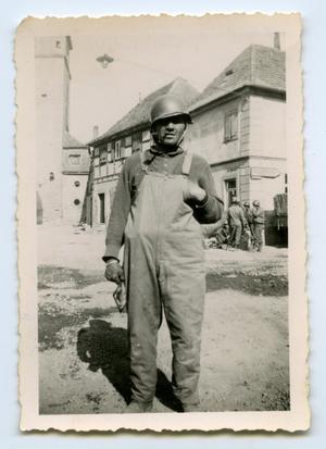 [A Soldier Wearing Wearing Overalls]