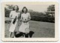 Photograph: [Photograph of Ginny Hoyt and Linda Aten Playing Badminton]