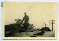 Photograph: [Photograph of Soldier on Airplane]