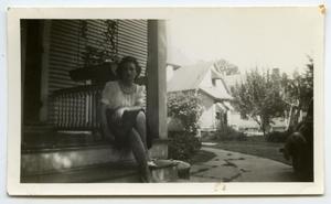 Primary view of object titled '[Photograph of a Woman on a Porch]'.