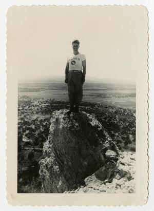 [Photograph of a Soldier on top of a Hill]