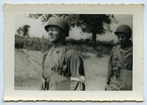 [Two Soldiers Walking Down a Path]