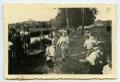 Photograph: [Photograph of People on Riverbank]