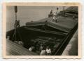 Photograph: [Soldiers Working on a Transport Ship Filled with Ammunition]