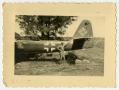 Photograph: [Soldier By Nazi Plane]