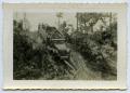 Photograph: [Photograph of Soldiers in a Sloped Carrier Vehicle]