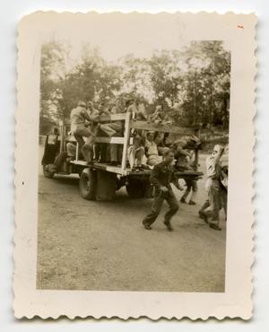 [Photograph of Soldiers Getting off a Truck]