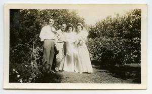 [Photograph of a Man, a Soldier, and Two Ladies]