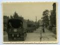Photograph: [Two Soldiers Riding in a Truck]